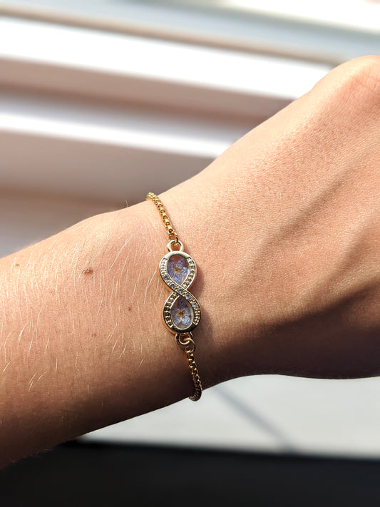 Infinity Bracelet with “Forget-Me-Not” flowers