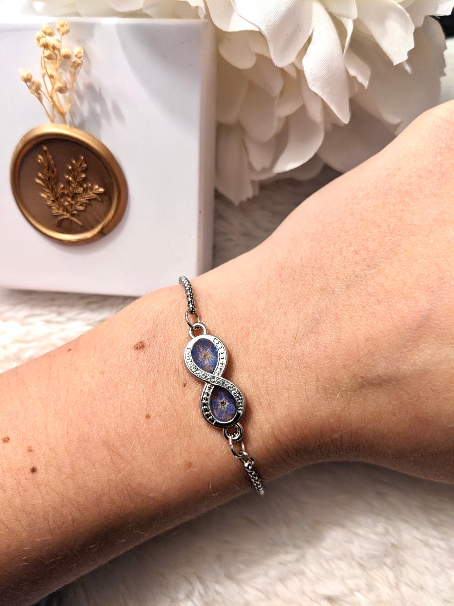 Infinity Bracelet with “Forget Me Not” Flowers