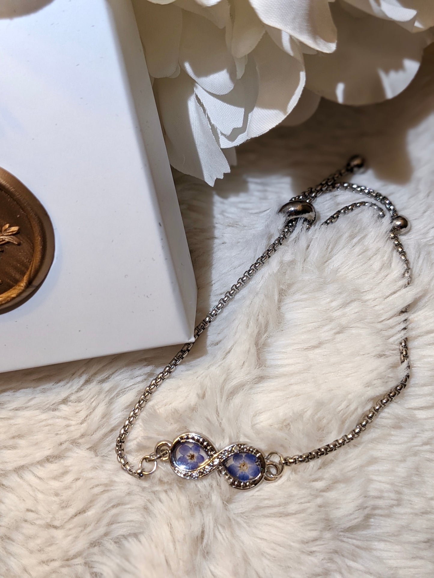 Infinity Bracelet with “Forget Me Not” Flowers
