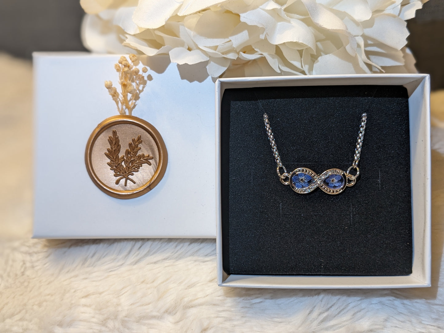 Infinity Bracelet with “Forget Me Not” Flowers