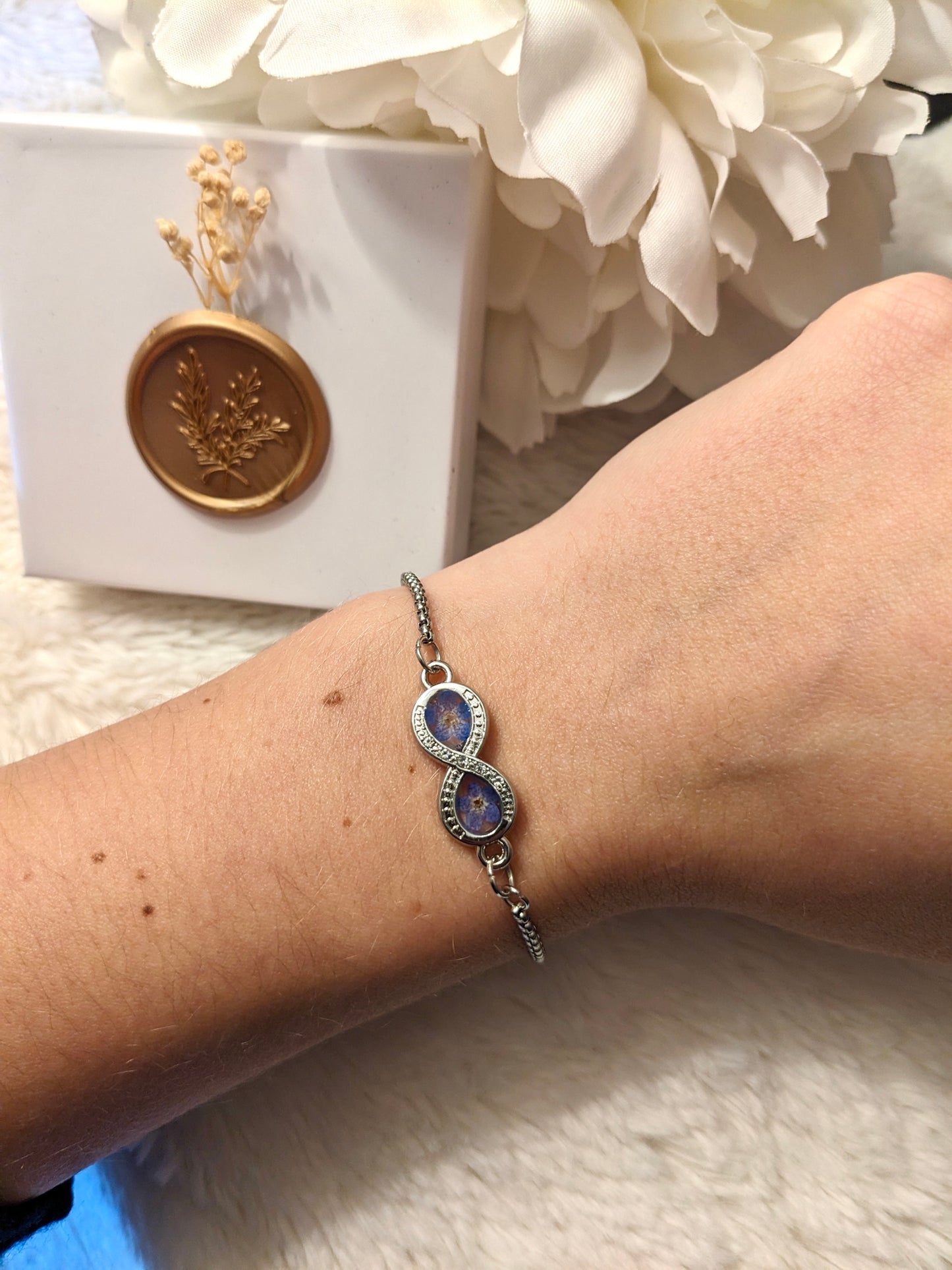 Infinity Bracelet with “Forget Me Not” Flowers